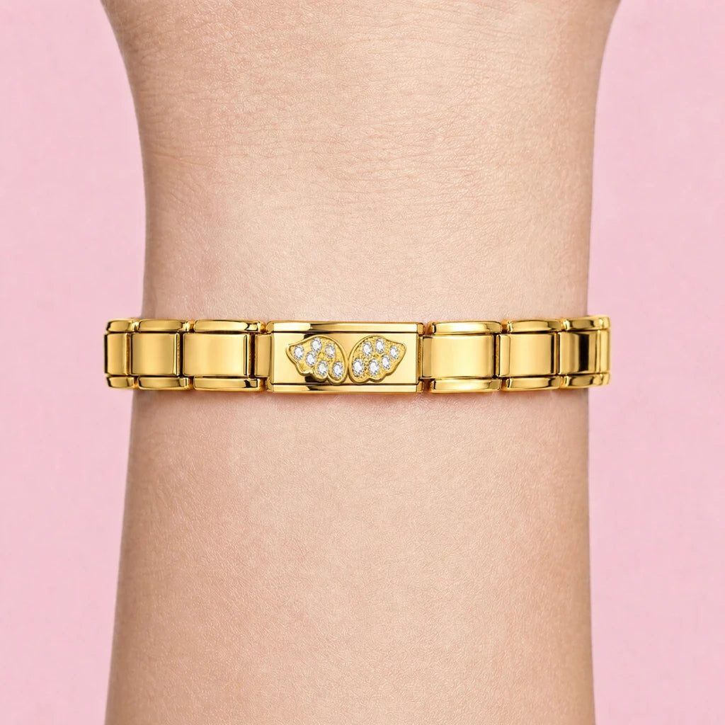Golden Angel Wings charm worn on a gold Italian bracelet