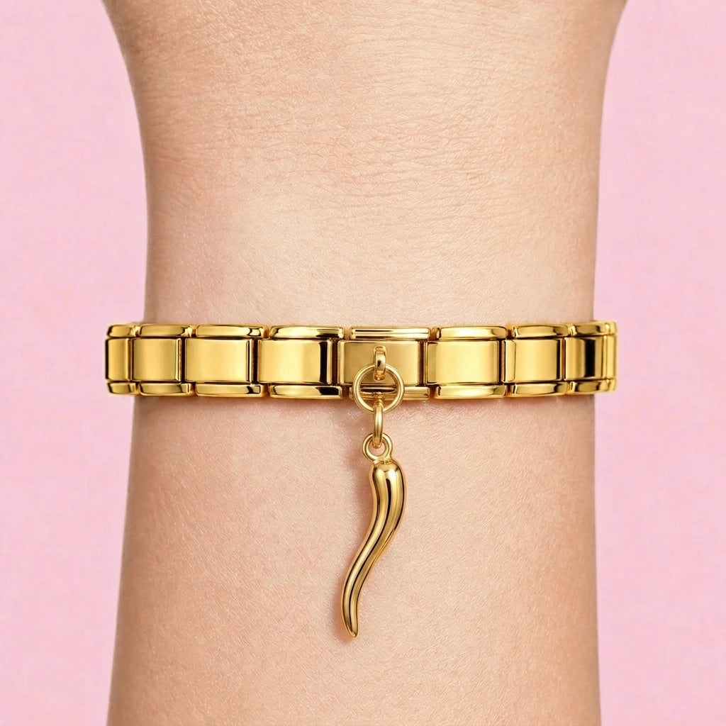 Italian horn dangle charm worn on a gold Italian bracelet