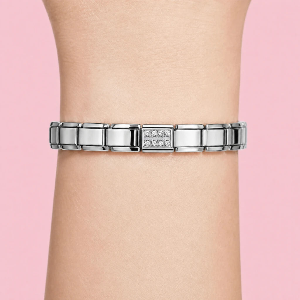 Clear Pavé charm worn on a silver Italian bracelet