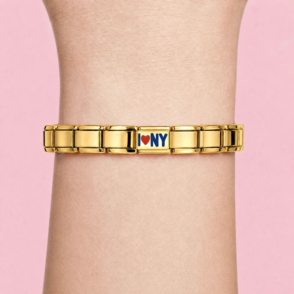 I Love NY charm worn on a gold Italian bracelet