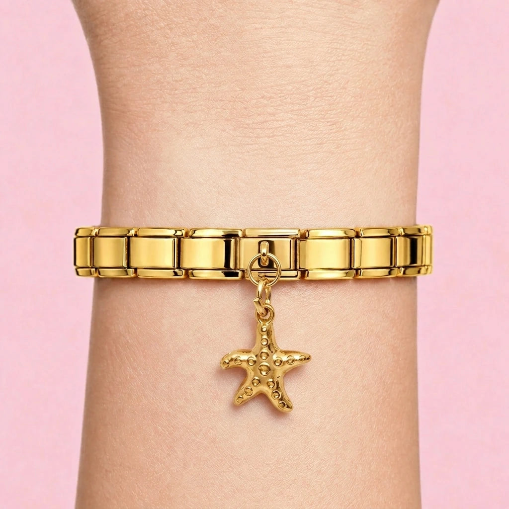 Starfish dangle charm worn on a gold Italian bracelet