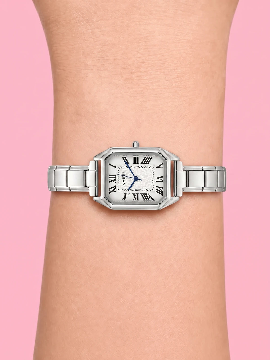 NAIDU rectangular watch on the wrist