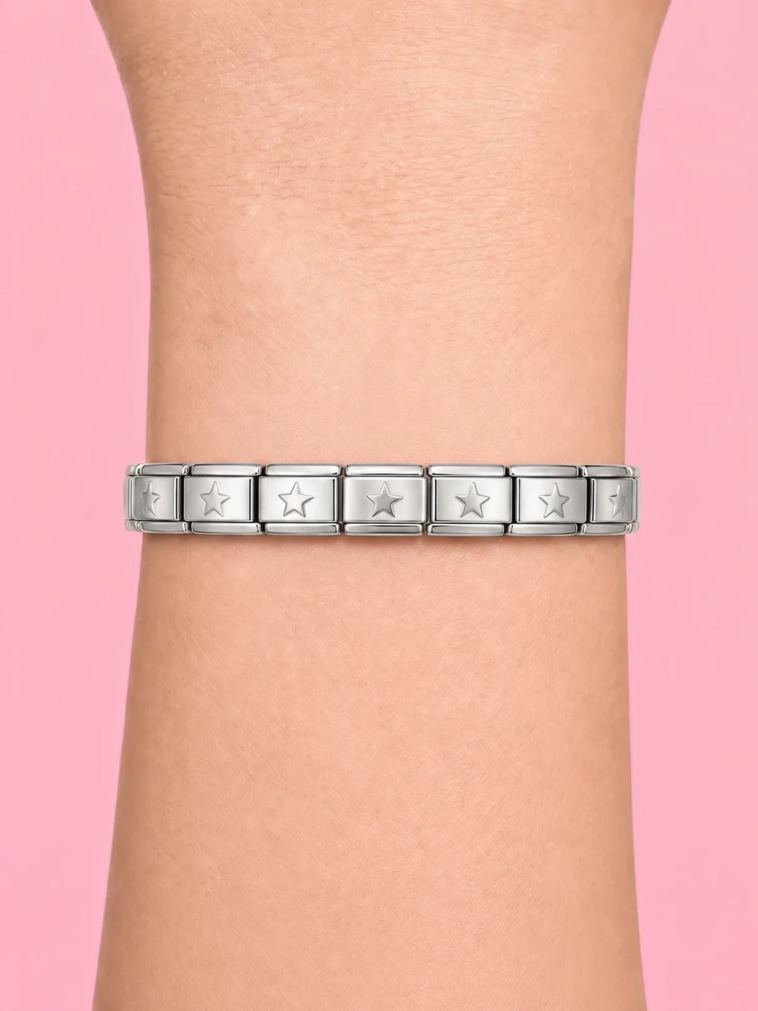 Silver star Italian charm bracelet on the wrist