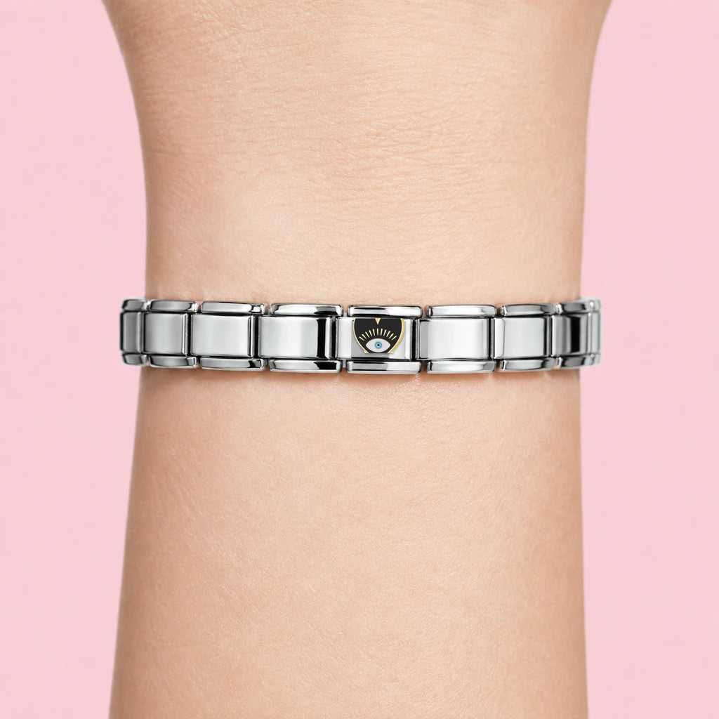 Black Heart Eye Charm on wrist