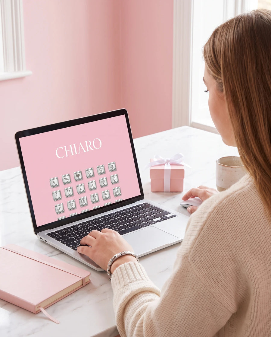 Customer choosing a custom Italian charm design on the CHIARO website