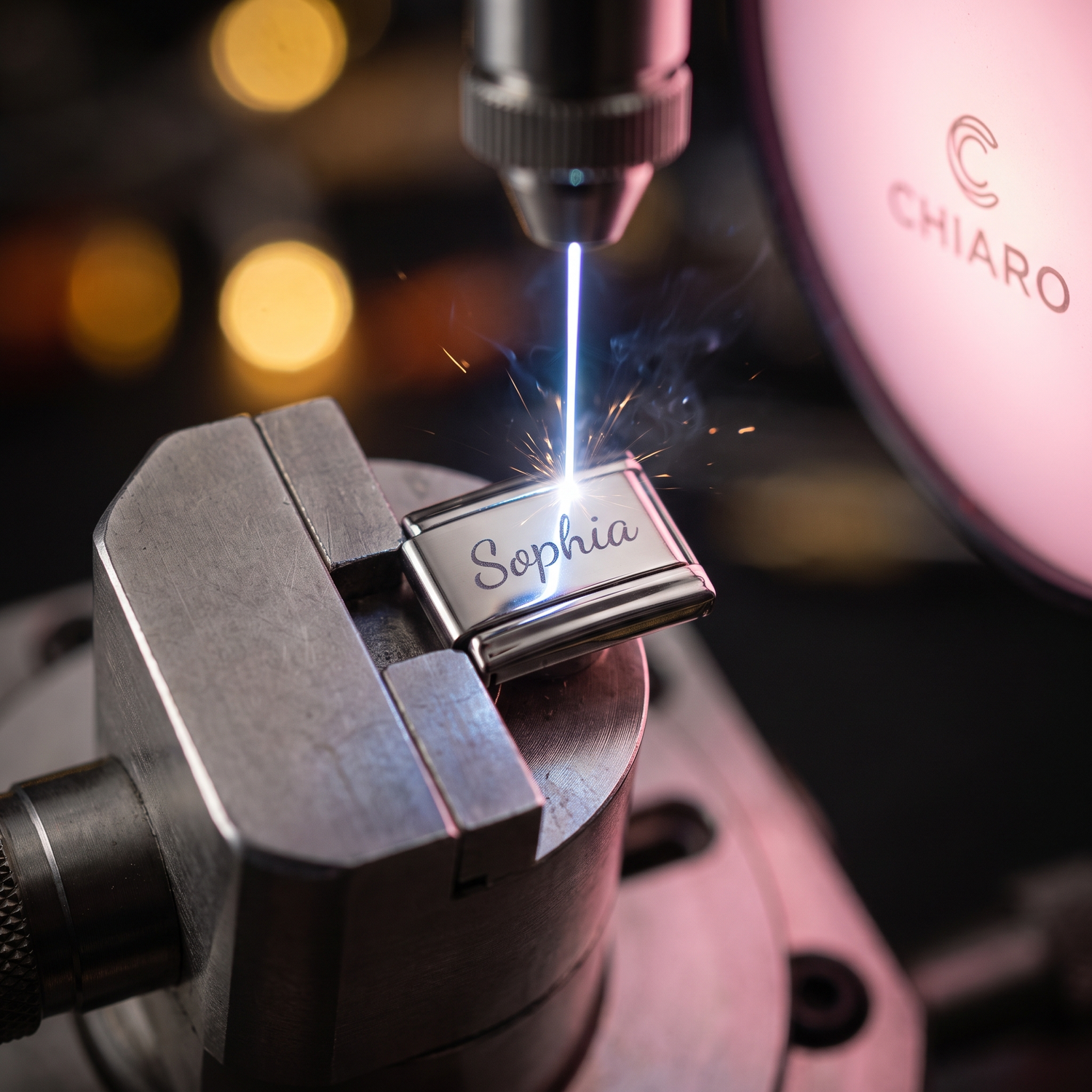 Laser engraving a name on a CHIARO Italian charm