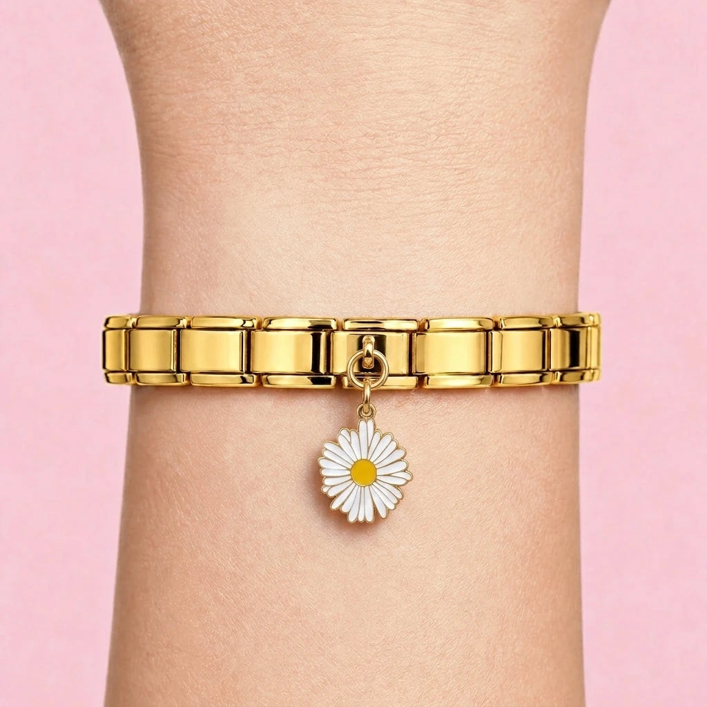 Daisy dangle charm worn on a gold Italian bracelet