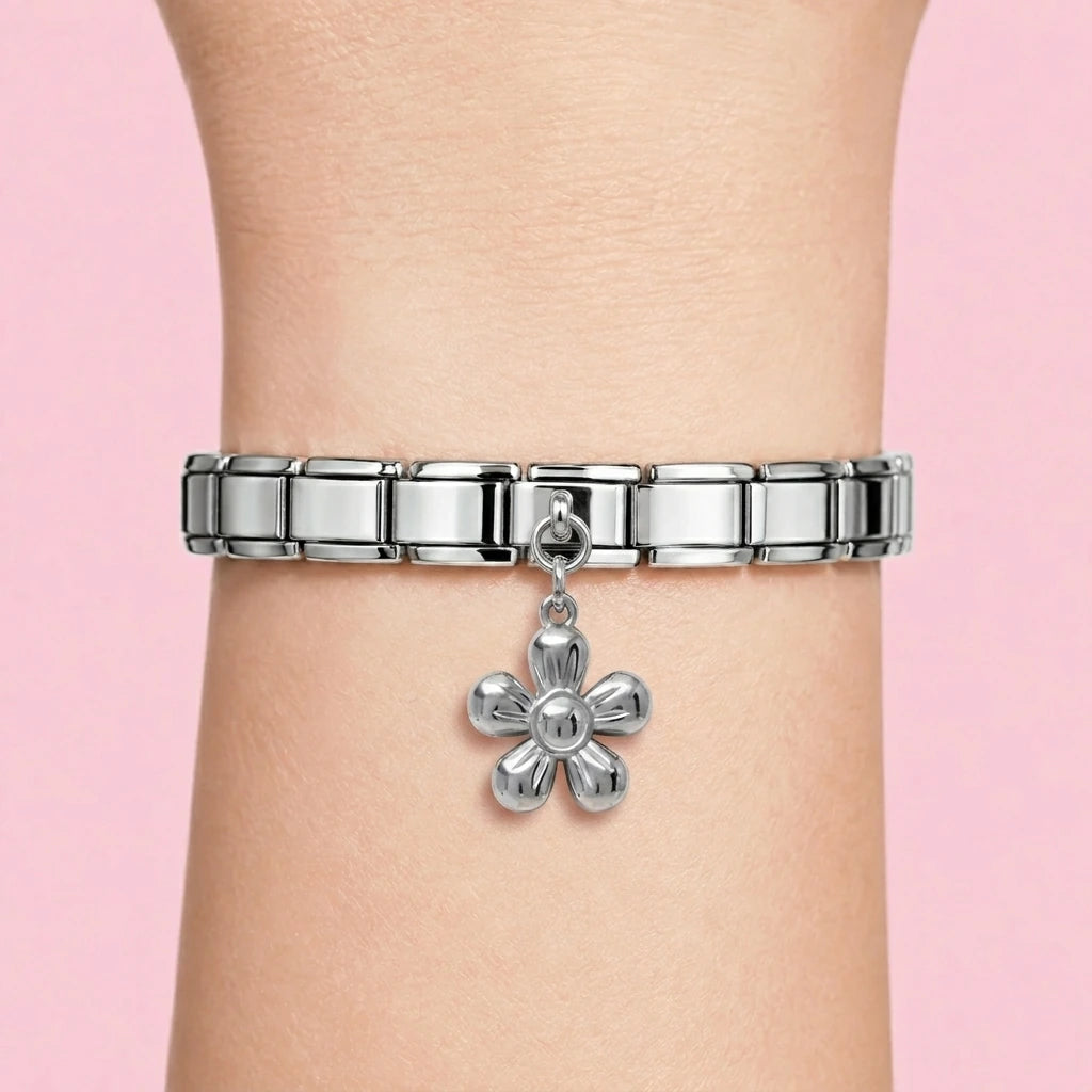 Flower dangle charm worn on a silver Italian bracelet