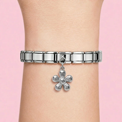 Flower dangle charm worn on a silver Italian bracelet