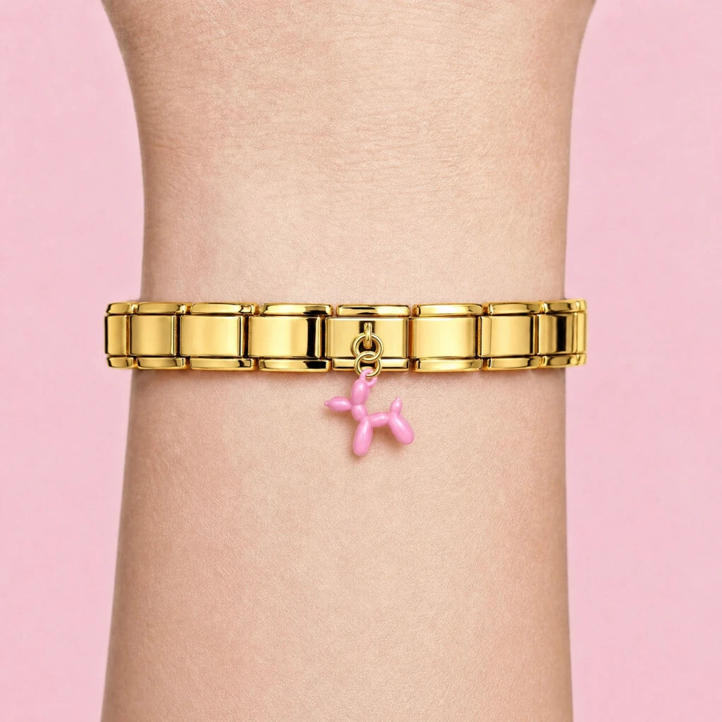 Balloon Dog charm worn on a gold Italian bracelet