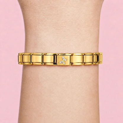 Golden Dragonfly charm worn on a gold Italian bracelet