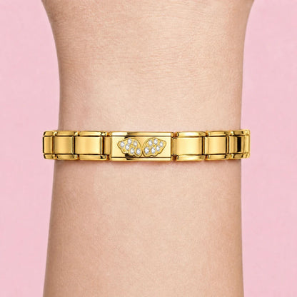 Golden Angel Wings charm worn on a gold Italian bracelet
