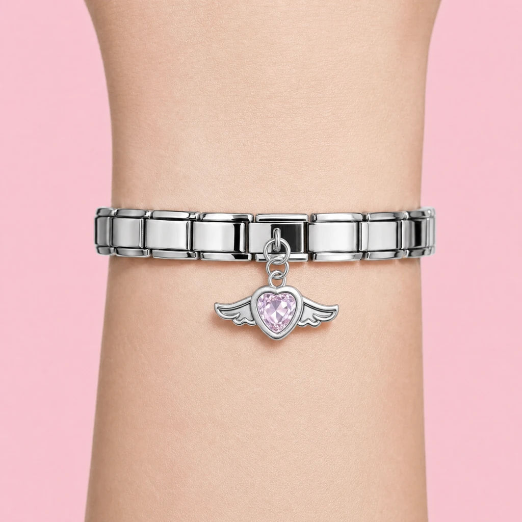 Winged Heart charm worn on a silver Italian bracelet