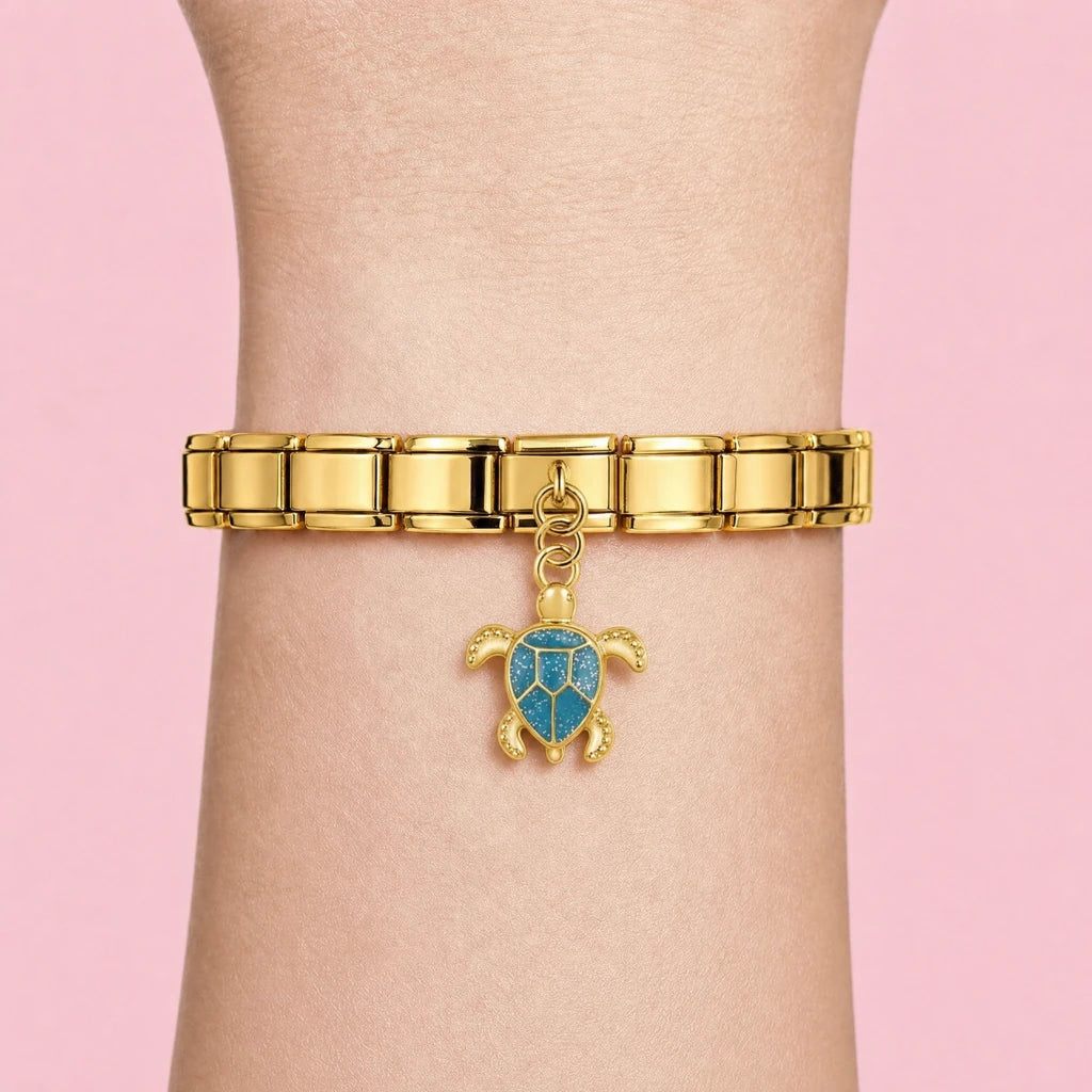 Golden Sea Turtle charm worn on a gold Italian bracelet
