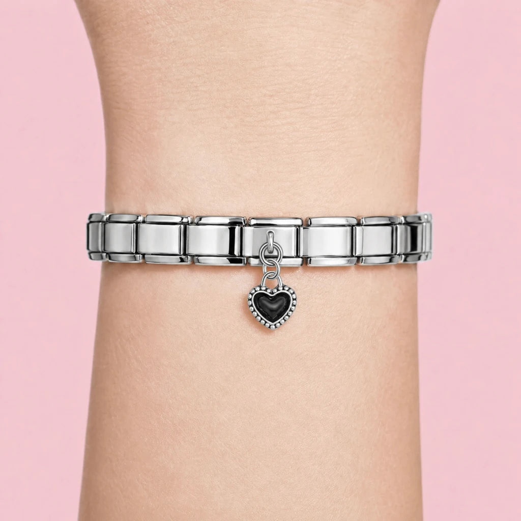 Black Heart charm worn on a silver Italian bracelet