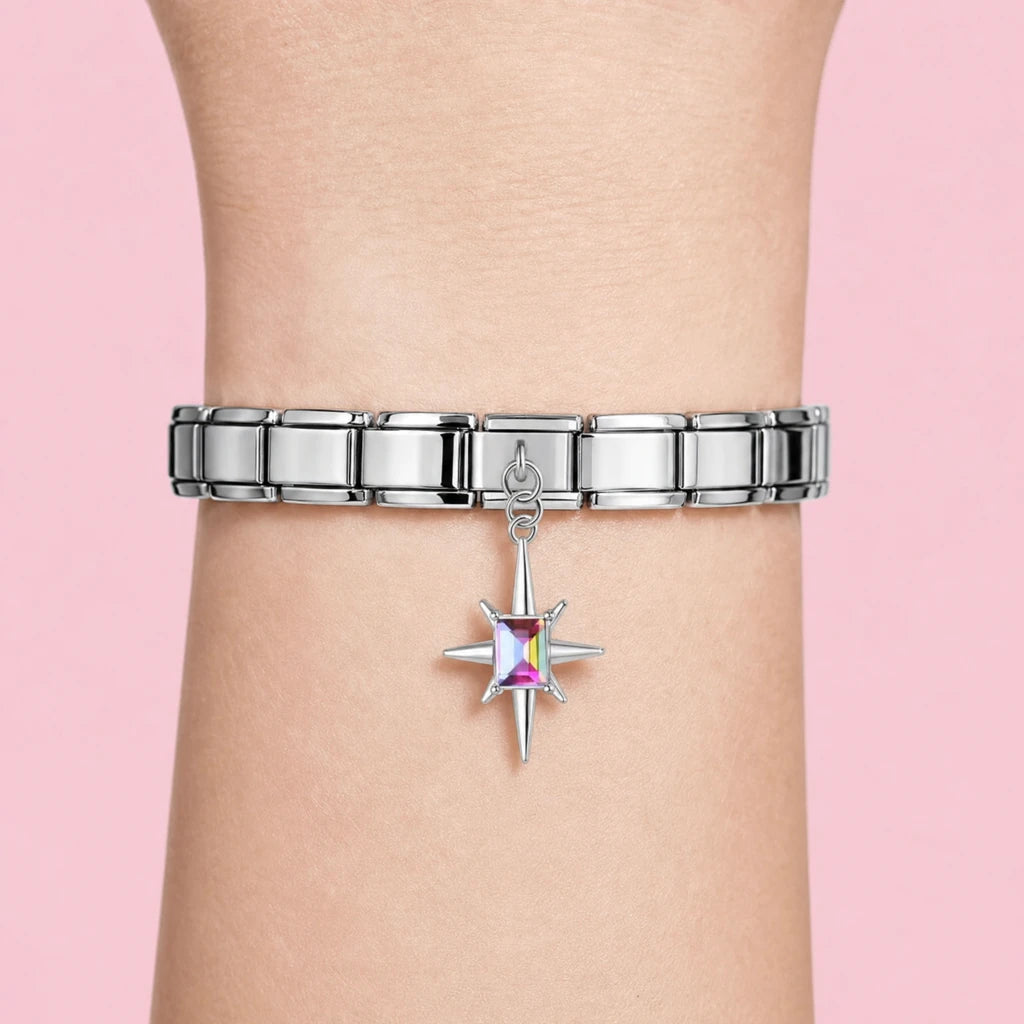 Aurora Starburst charm worn on a silver Italian bracelet