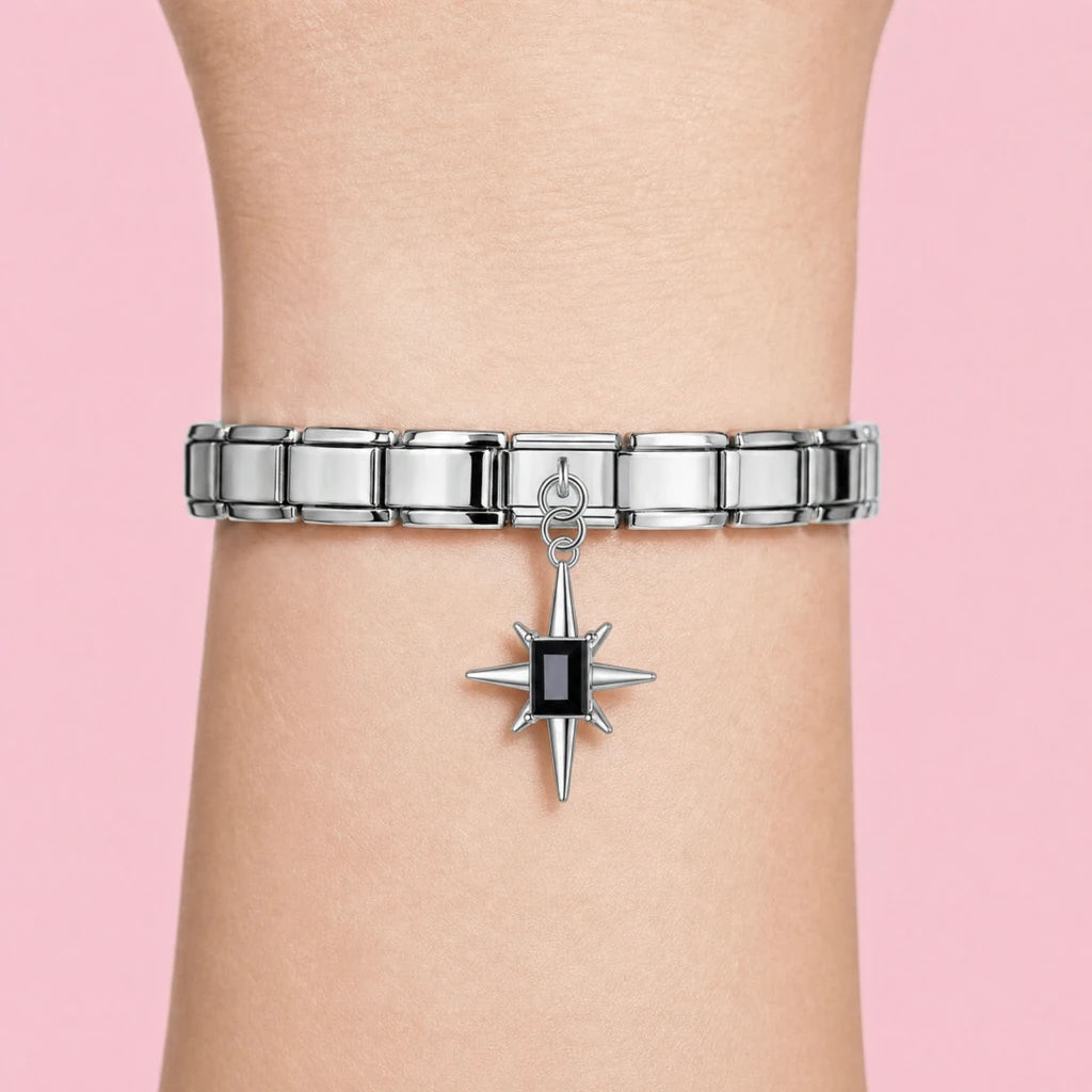 Onyx Starburst charm worn on a silver Italian bracelet