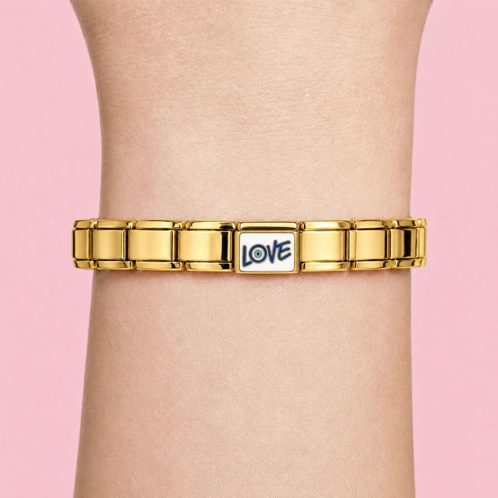 Love Eye charm worn on a gold Italian bracelet