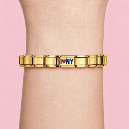 I Love NY charm worn on a gold Italian bracelet