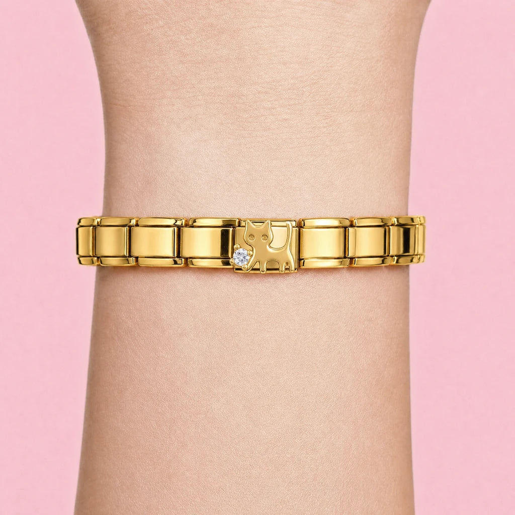 Golden Cat charm worn on a gold Italian bracelet