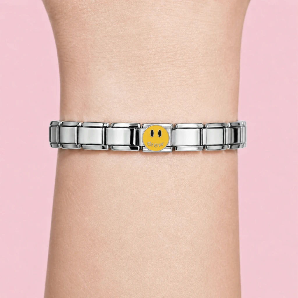 Happy Face charm worn on a silver Italian bracelet