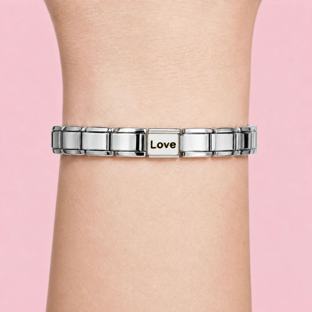 Love charm worn on a silver Italian bracelet