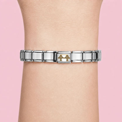 Brooklyn Bridge charm worn on a silver Italian bracelet