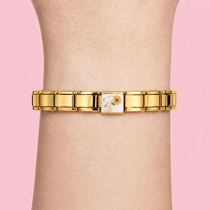 Sunflower Pup charm worn on a gold Italian bracelet