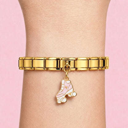Roller skate dangle charm worn on a gold Italian bracelet