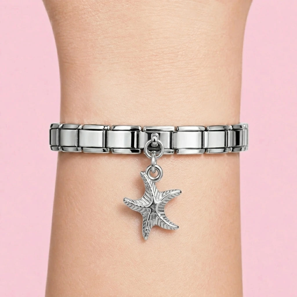 Starfish dangle charm worn on a silver Italian bracelet