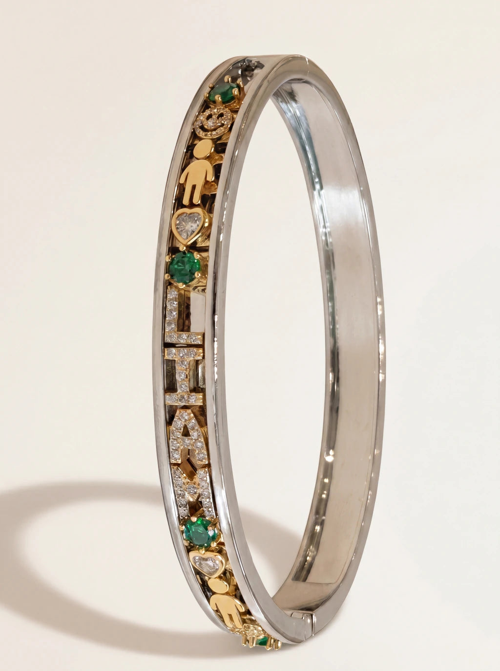 Charm bangle — gold