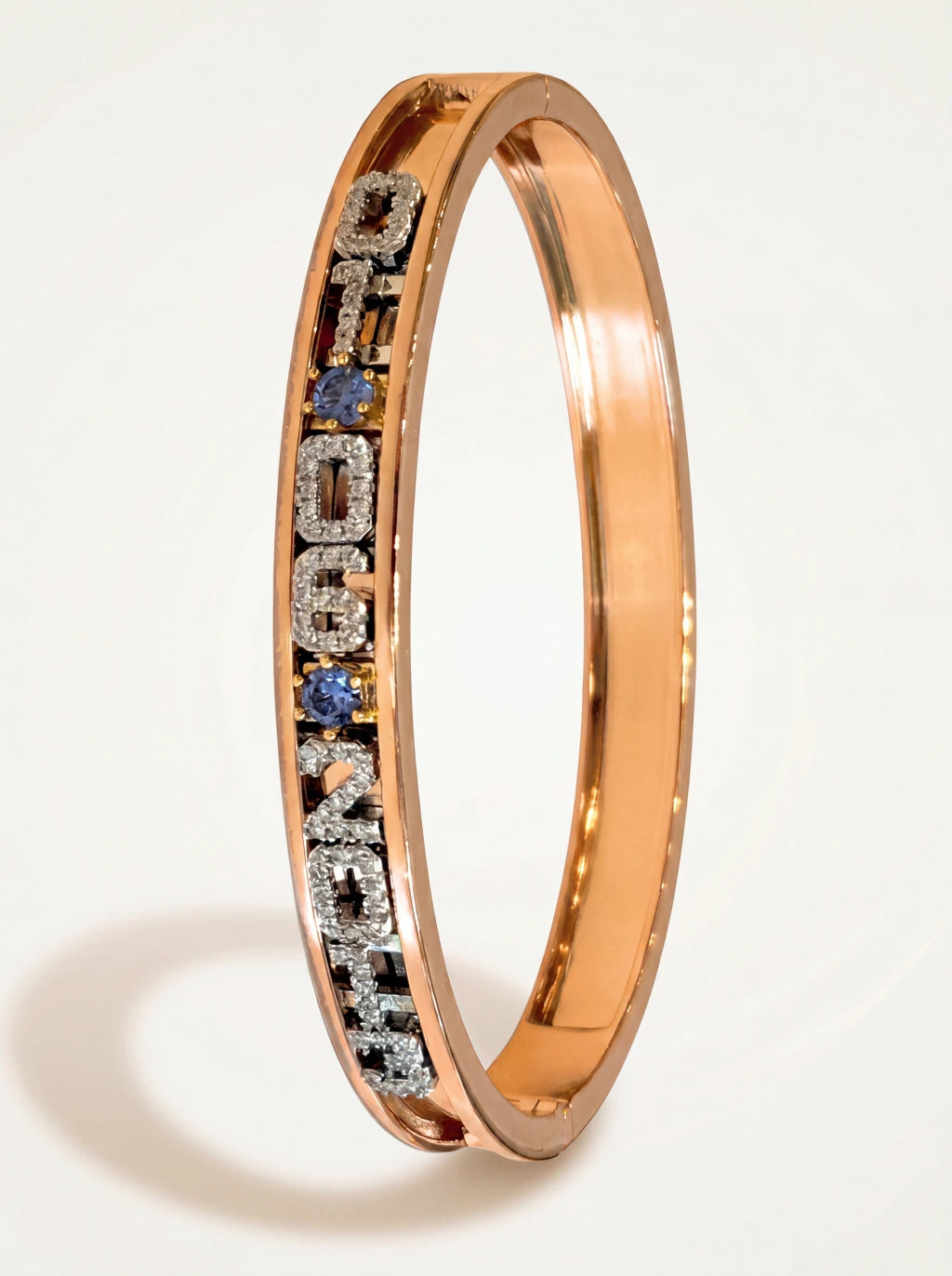 Charm bangle — gold